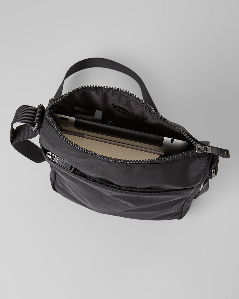 TRAVEL CROSSBODY BAG
