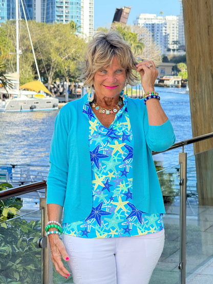 LULU B STARFISH SPLASH SLEEVELESS RUFFLE TOP