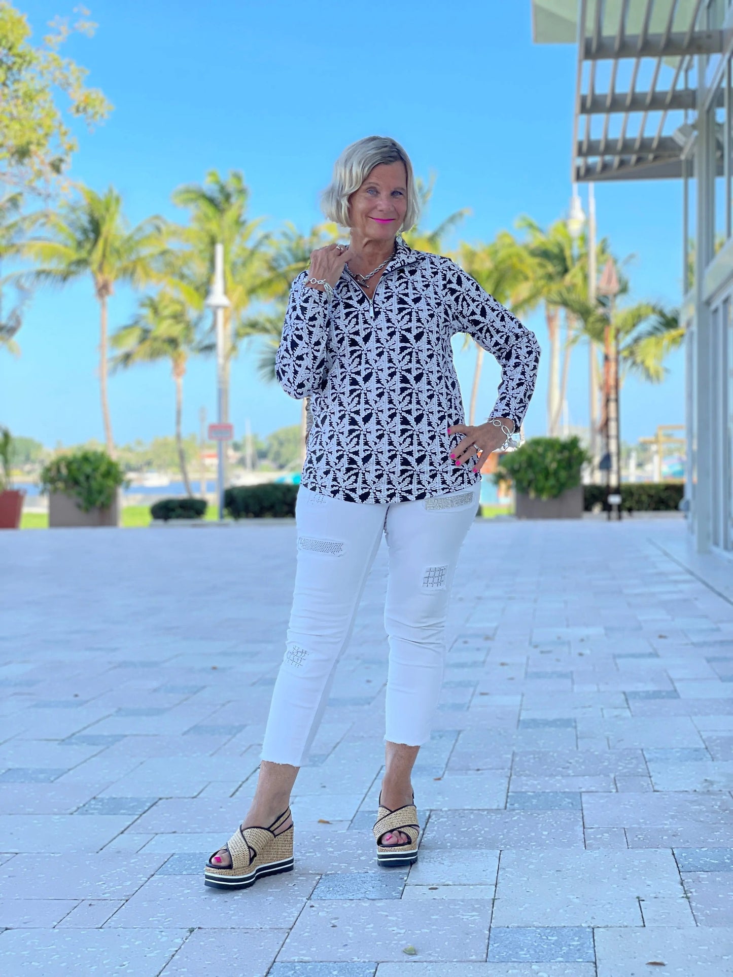 BLACK AND BEIGE PALM ZIPPER TOP