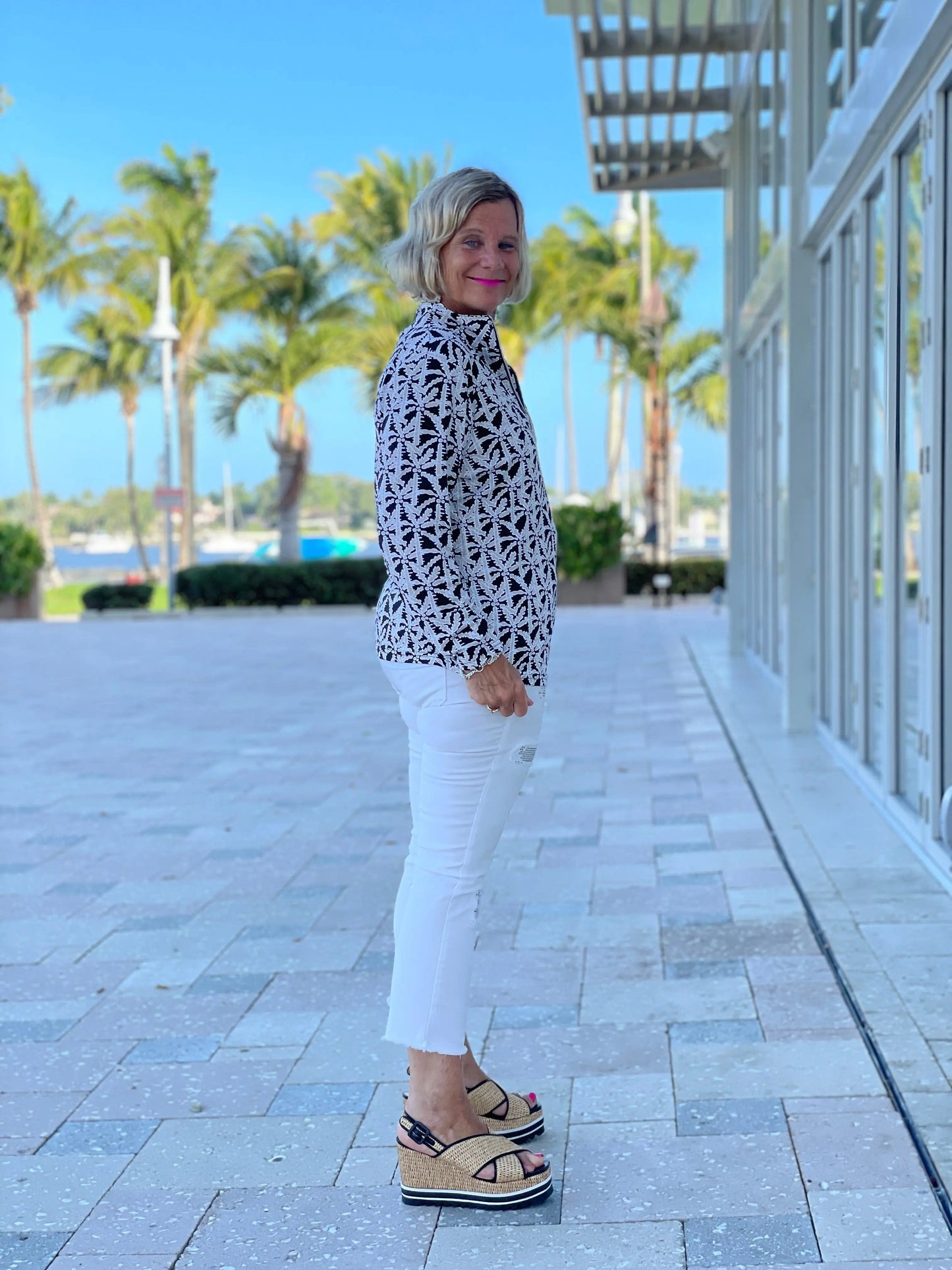 BLACK AND BEIGE PALM ZIPPER TOP
