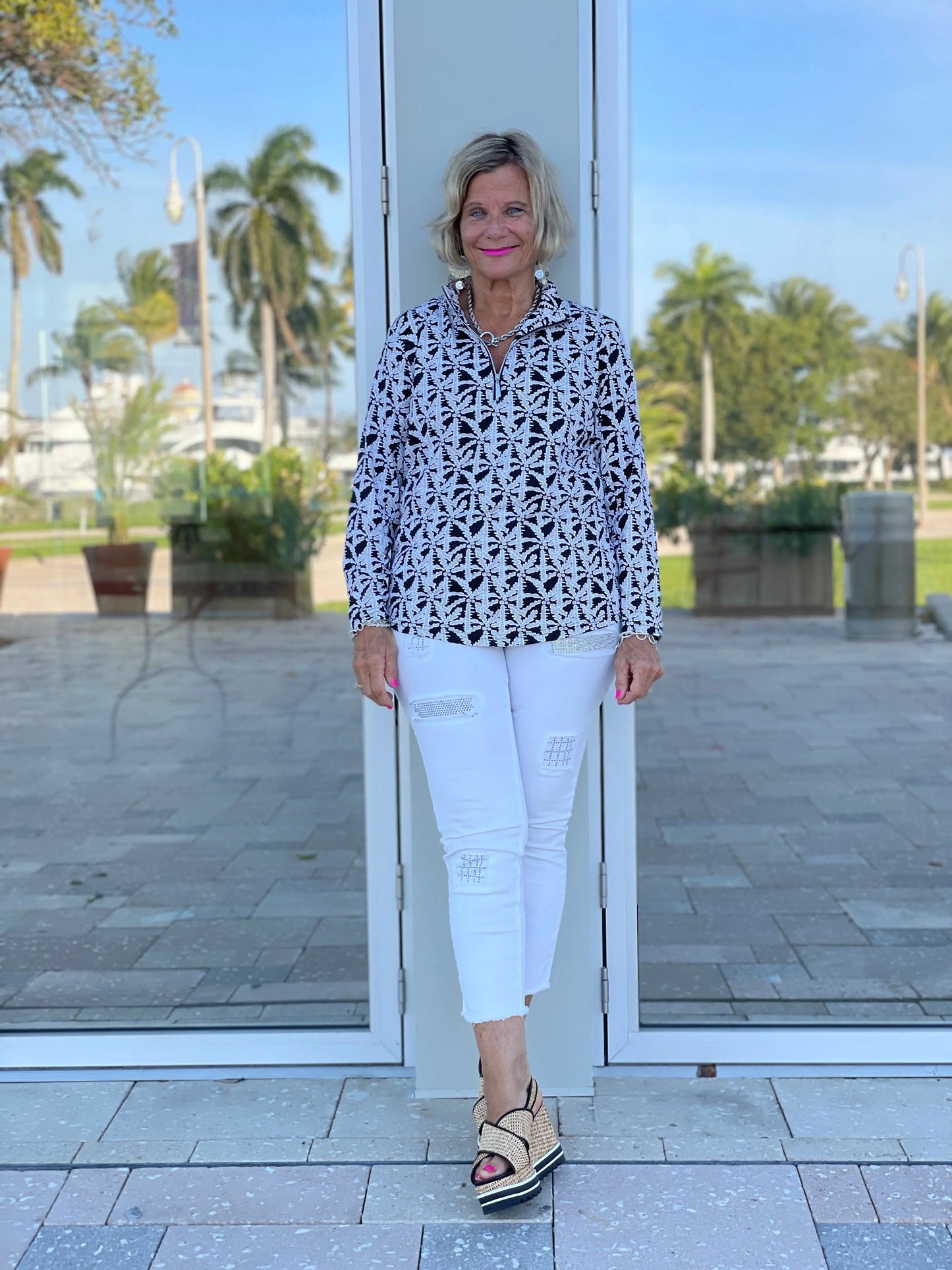 BLACK AND BEIGE PALM ZIPPER TOP