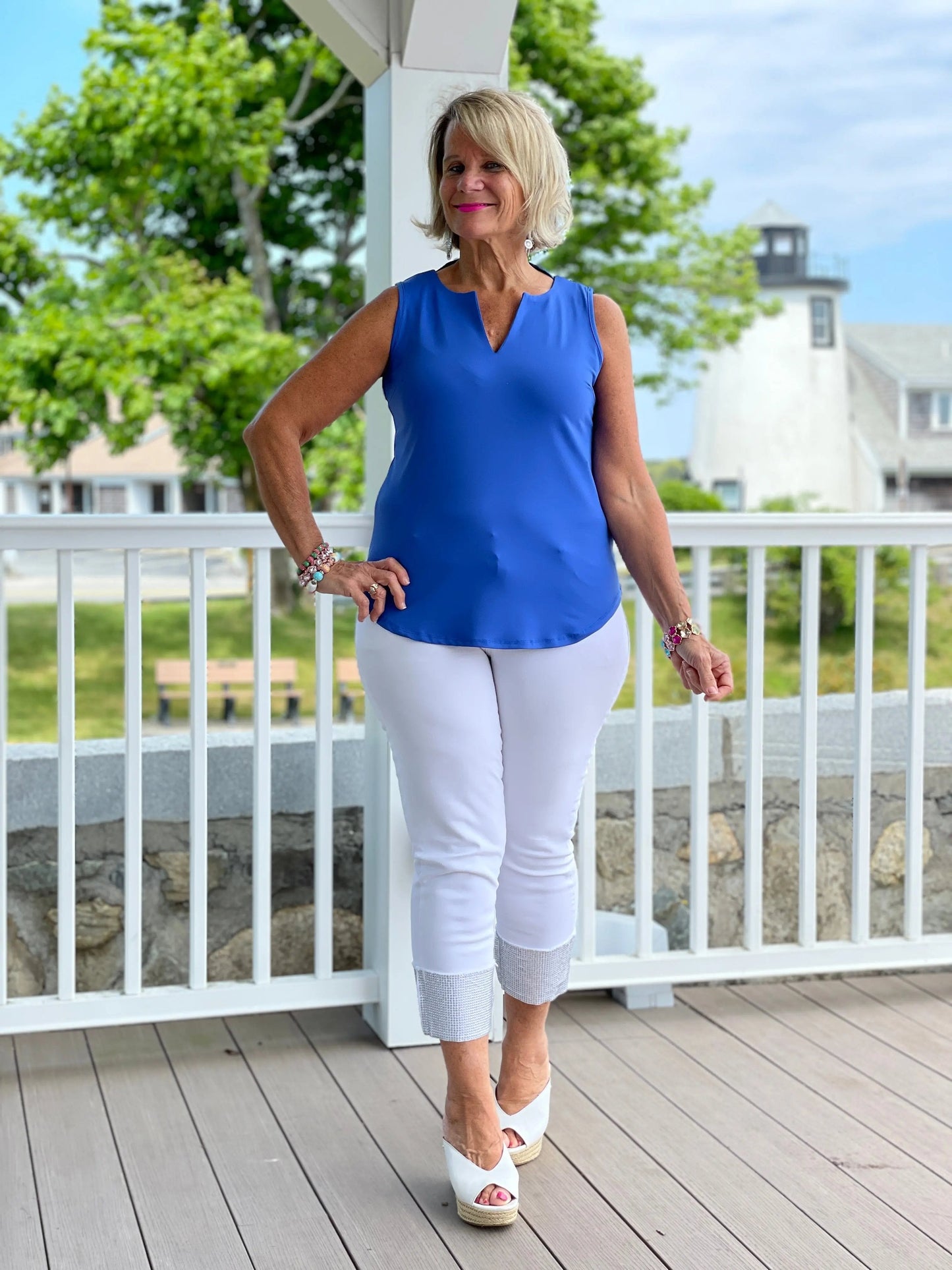 BLUE SLEEVELESS V-NECK TOP
