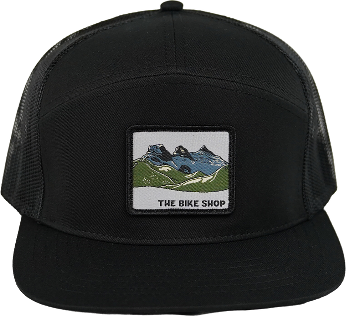 7 Panel Trucker - Woven Crest