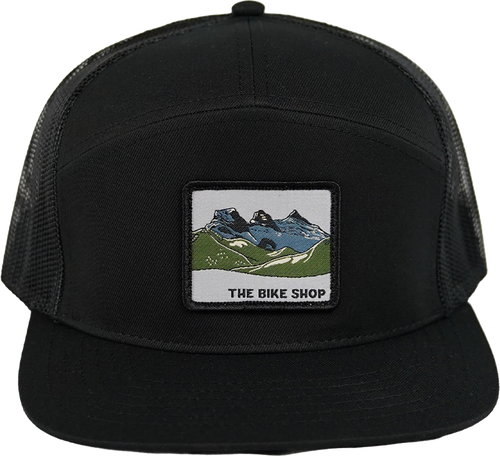 7 Panel Trucker - Woven Crest