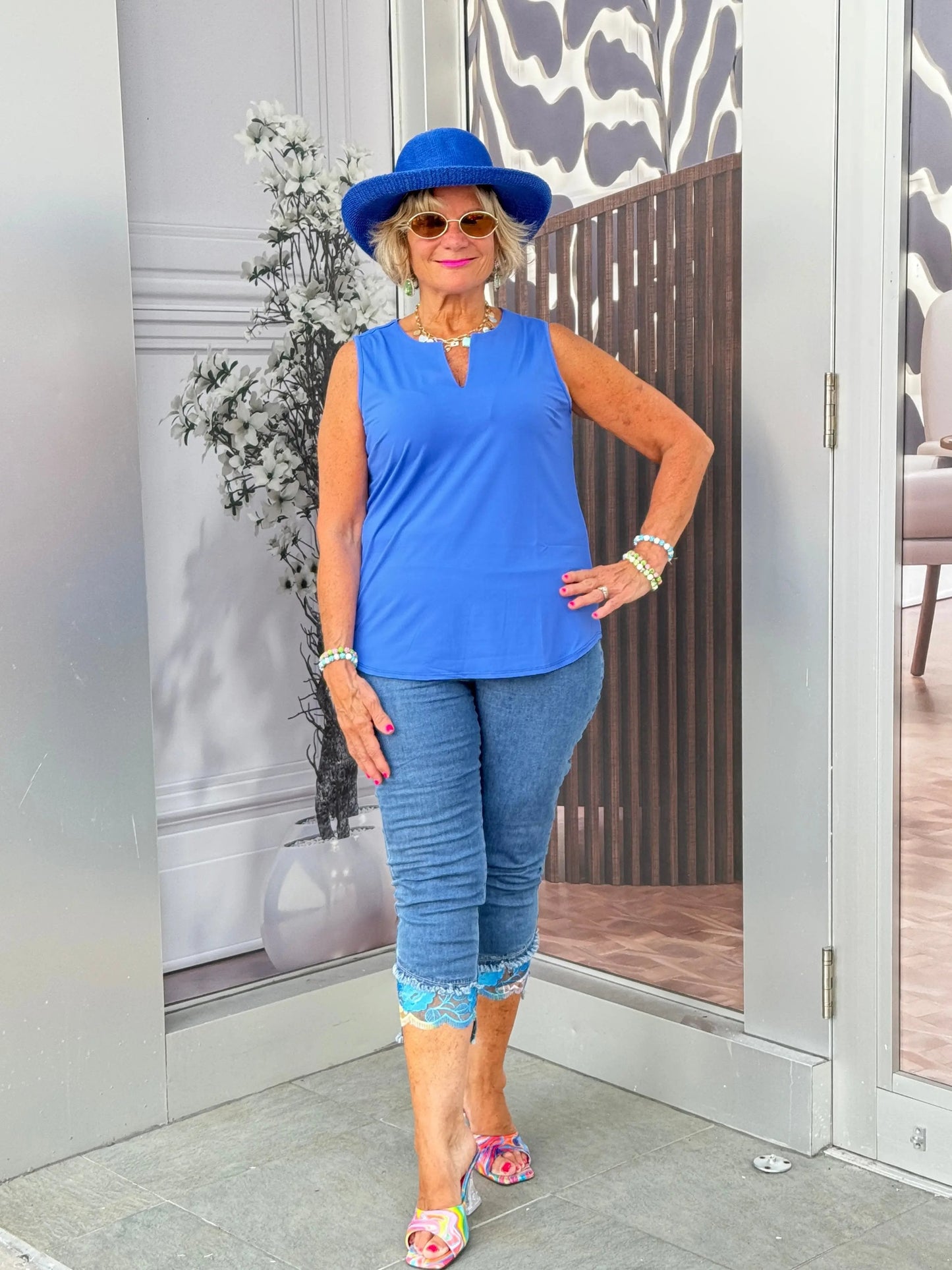 BLUE SLEEVELESS V-NECK TOP