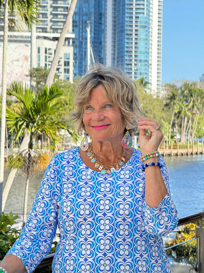 LULU B COASTAL BLOOM ASYMMETRIC TOP