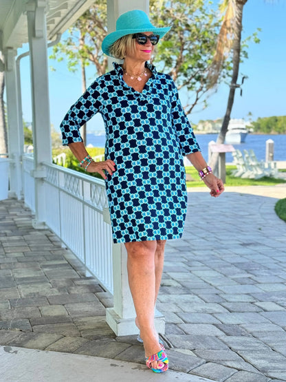 BLUE MEDALLION SLEEVE RUFFLE NECK DRESS