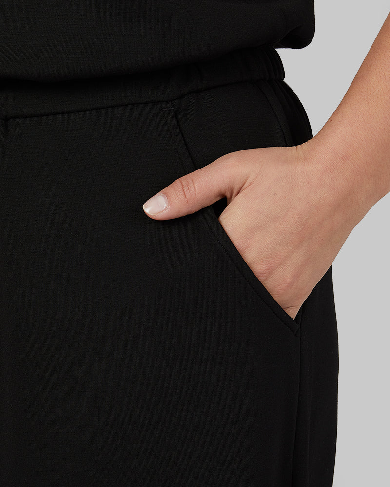 WOMEN'S STUDIO TECH JUMPSUIT