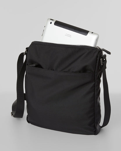 TRAVEL CROSSBODY BAG