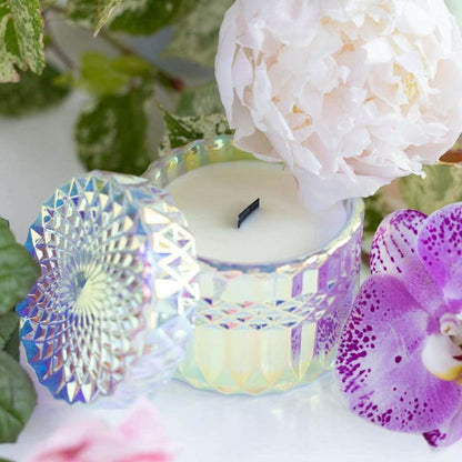 Iridescent etched candle holder with black wooden wick in Stacy k florals signature scent.
