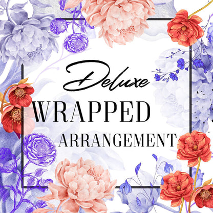 Floral arrangement with 'Deluxe Wrapped Arrangement' text