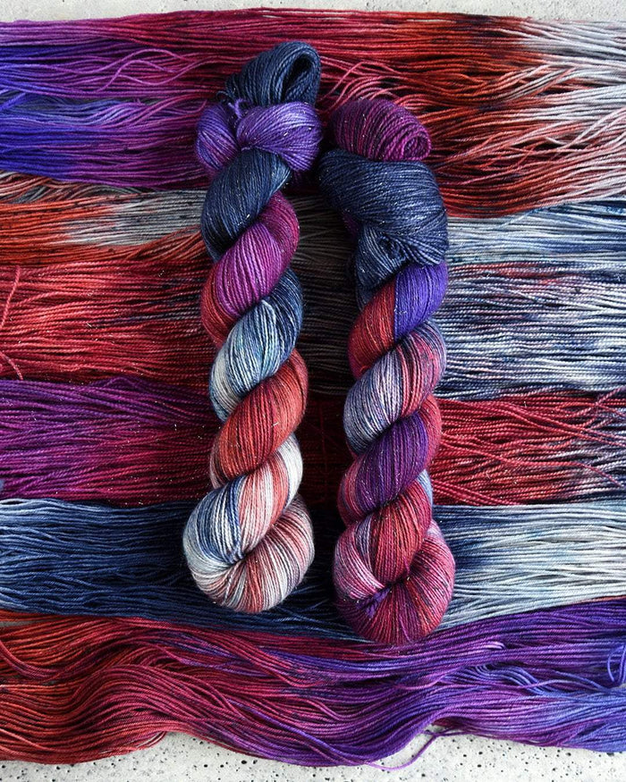 Destination Yarn fingering weight yarn Vermilion Summer