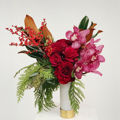 Half dozen roses with orchids white background